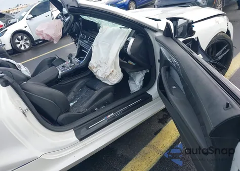 2024 BMW M8 Competition z USA, uszkodzony, nr VIN WBSDZ0C05RCP18148